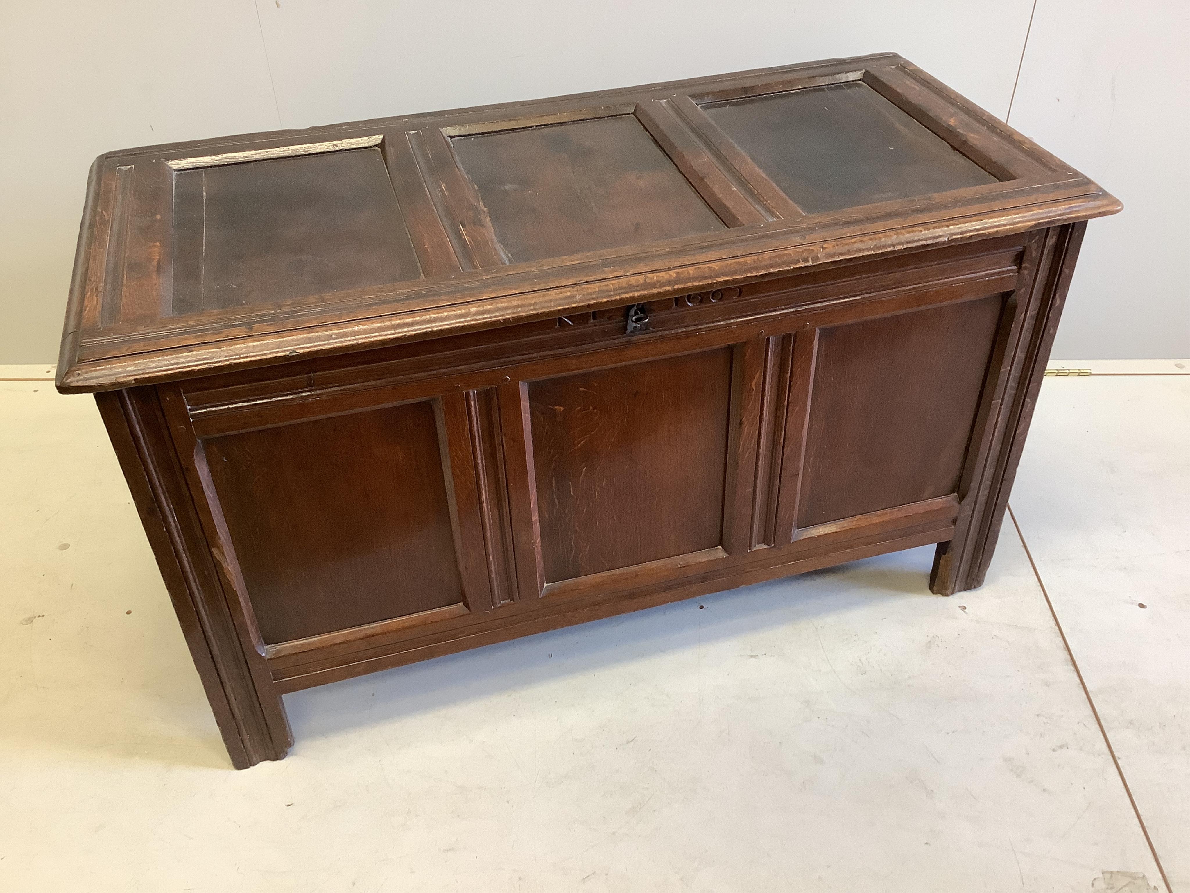 A Charles II oak coffer, dated 1683, width 117cm, depth 54cm, height 65cm. Condition - fair